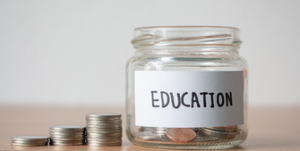 Coin jars labelled 'education'