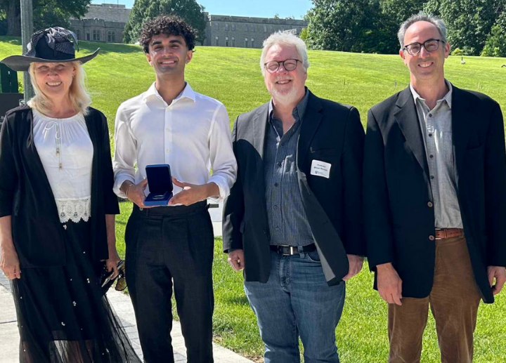 Photo of political science faculty and award winning student